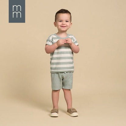  Adorable toddler in a light green and white striped outfit, smiling confidently on a beige backdrop. Perfect for the $5 Frenzy Sale—grab stylish and comfy outfits like this starting at just $5!